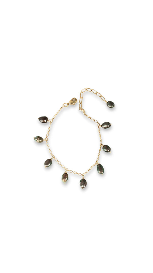 Pulsera artesanal con perlas naturales
